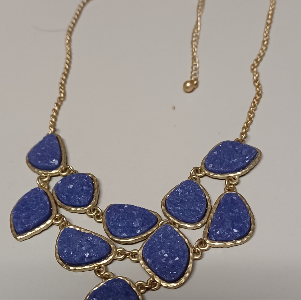 Gorgeous and rare Lapis Lazuli wrapped in gold bib necklace.
